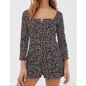 Bershka notch front romper in floral print